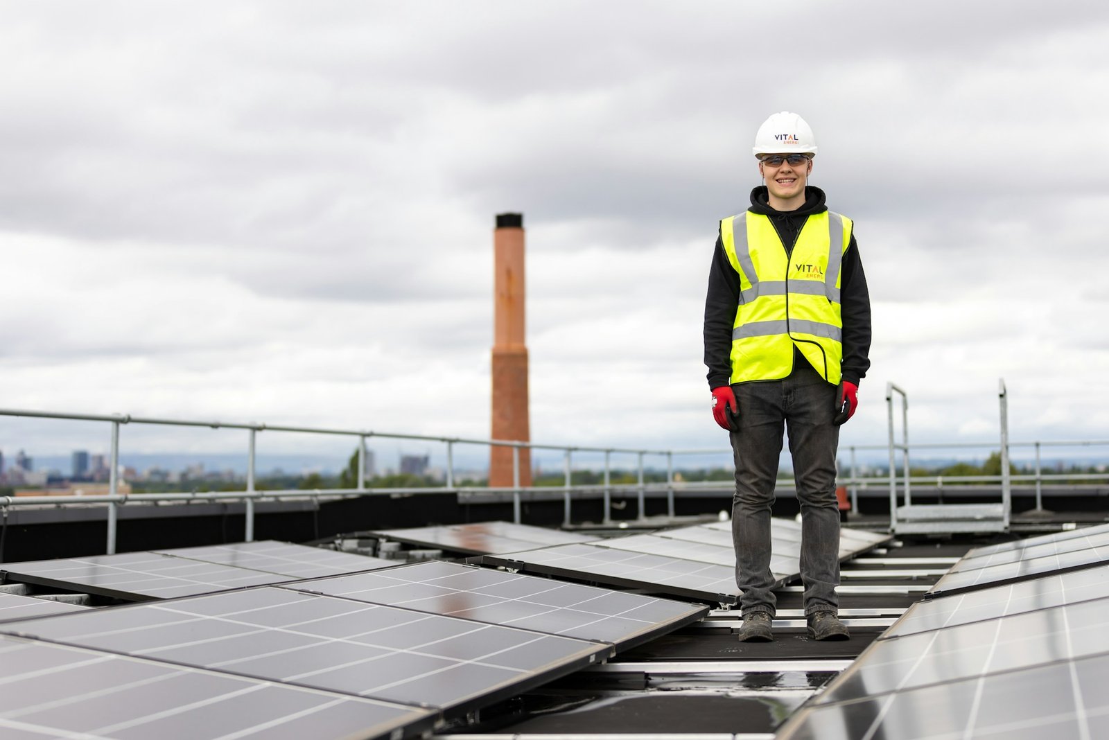 Faithful Spark installer on the roof during an Aberdeen solar panel installation