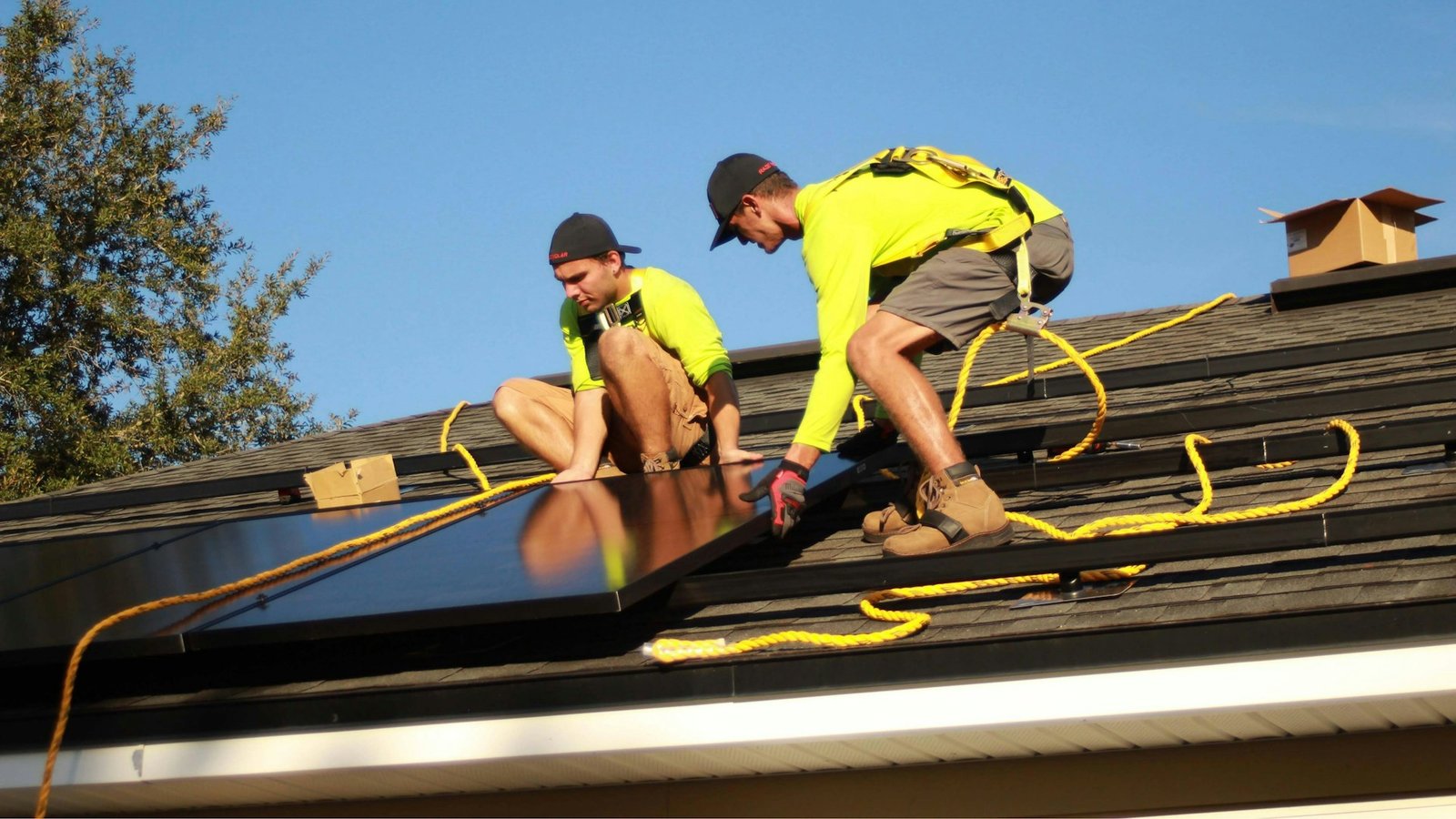 Solar panel installers commissioning a system in Aberdeenshire before SEG registration