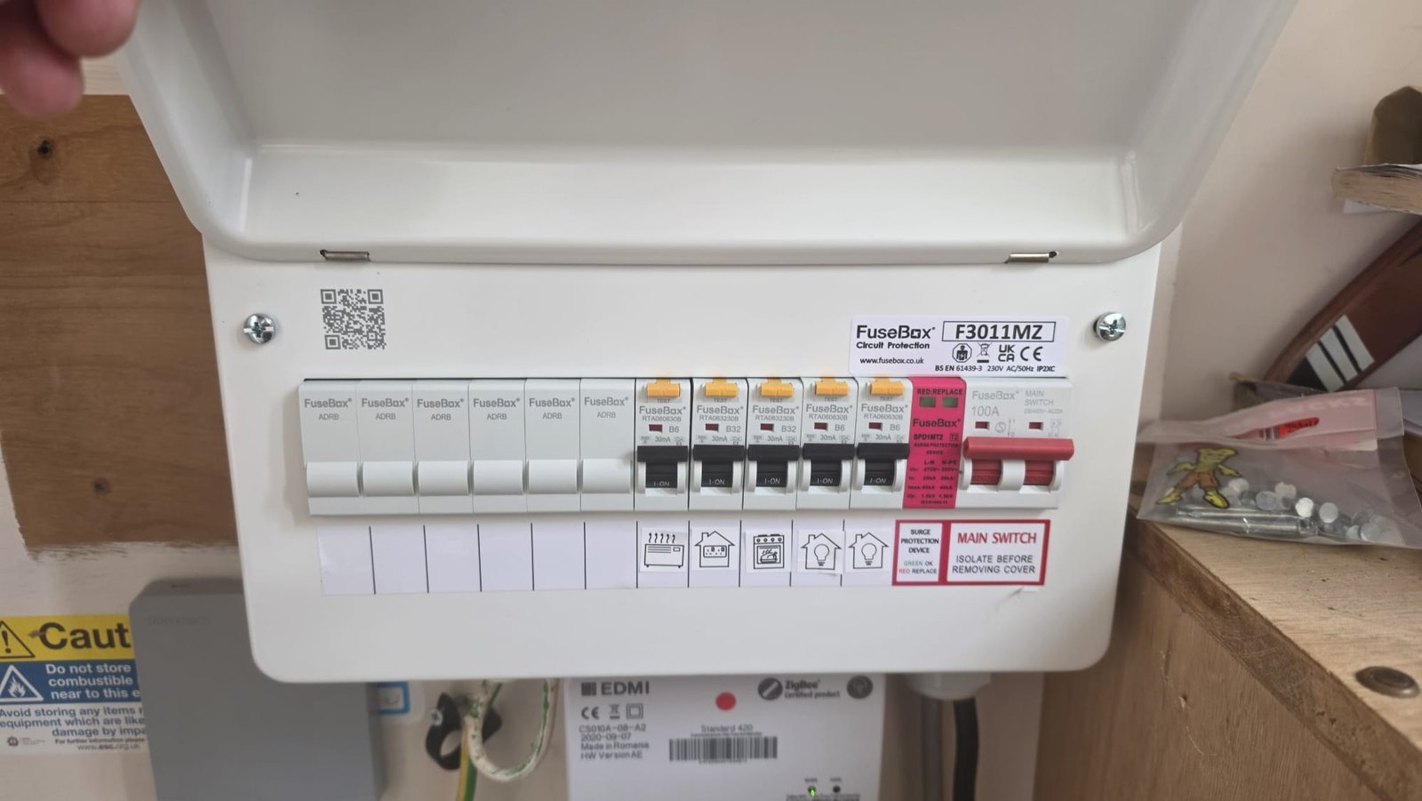 FuseBox RCBO consumer unit fitted next to a ZigBee-certified EDMI smart meter at an Aberdeen home