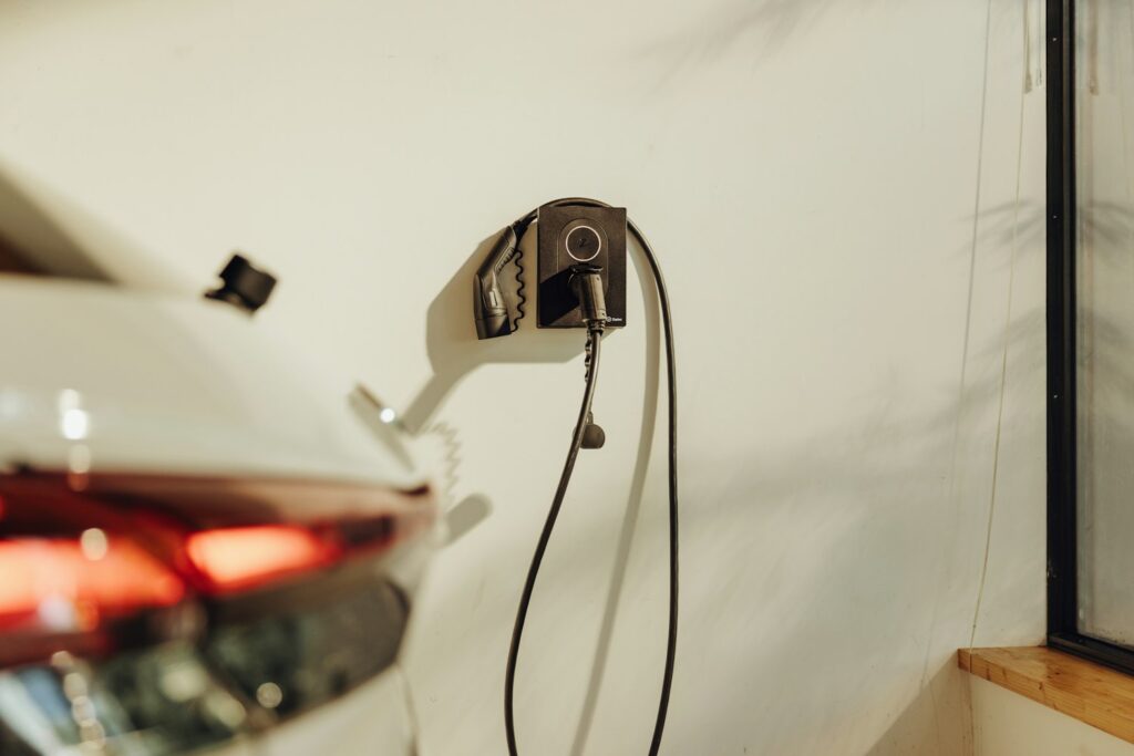 Home EV charger being installed by a qualified electrician in Scotland
