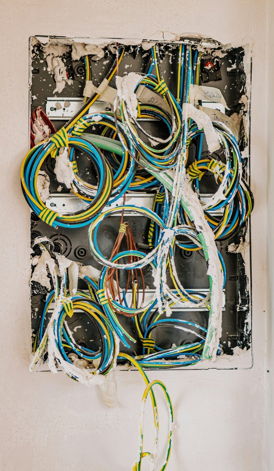 Electrician carrying out EICR remedial work in an Aberdeen property