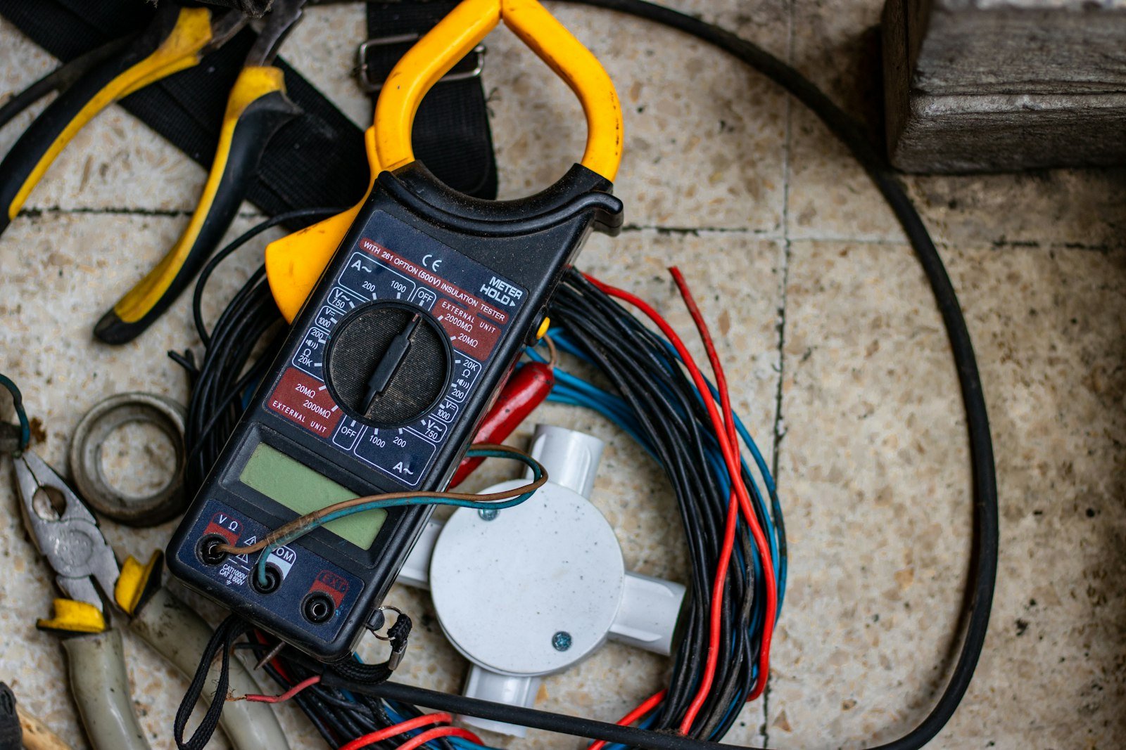 Electrician clamp meter tools and cable in Kingswells