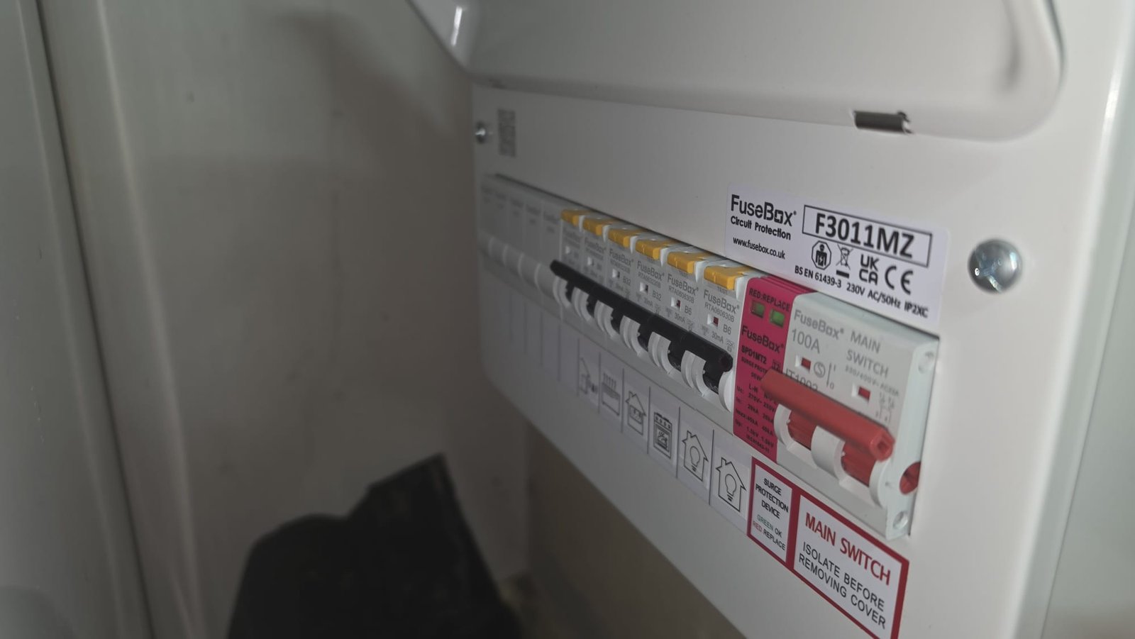 Side-angle hero shot of a new FuseBox F3011MZ consumer unit installed in Aberdeen