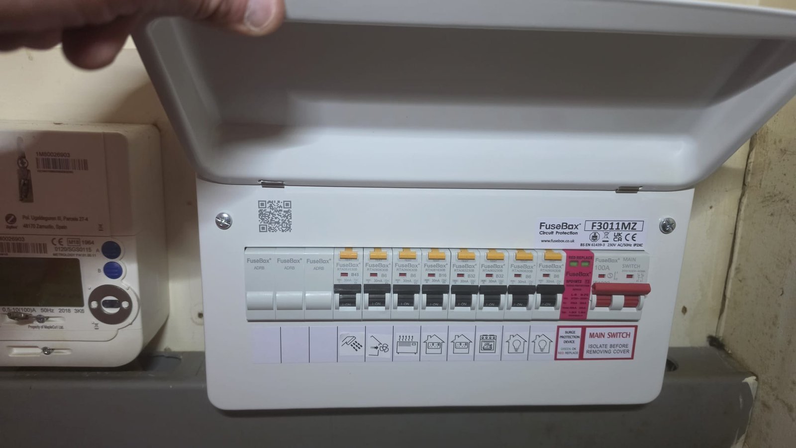 FuseBox F3011MZ RCBO board mid-installation in Aberdeenshire, with the new smart meter visible to the left