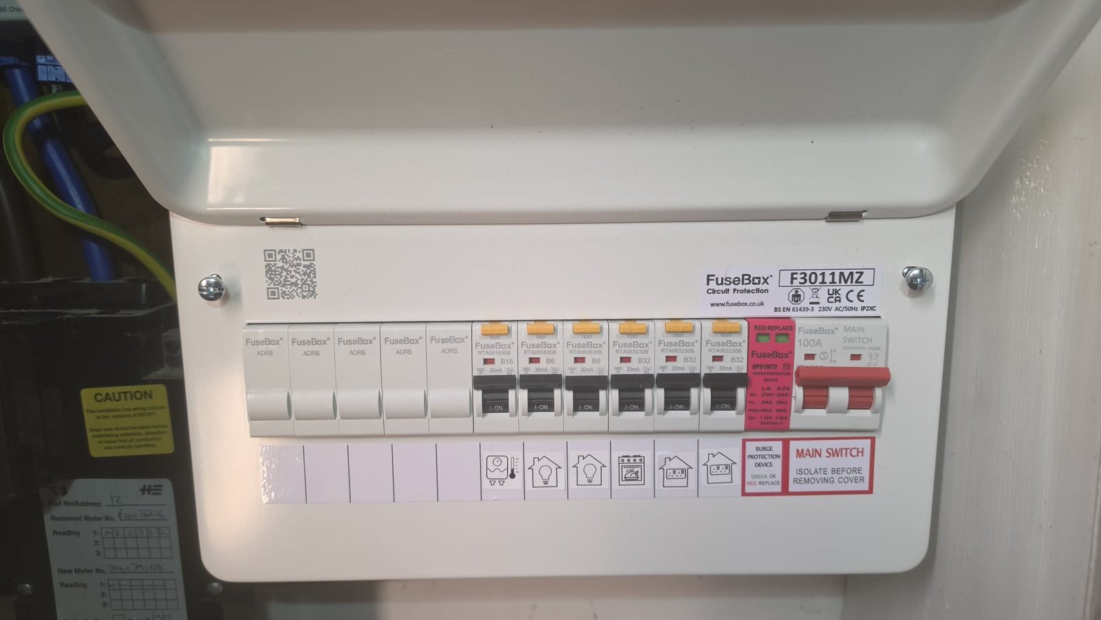 New-build consumer unit installation in Aberdeenshire. Meter changeover form visible for Plot 12, fitted by Faithful Spark Electricians