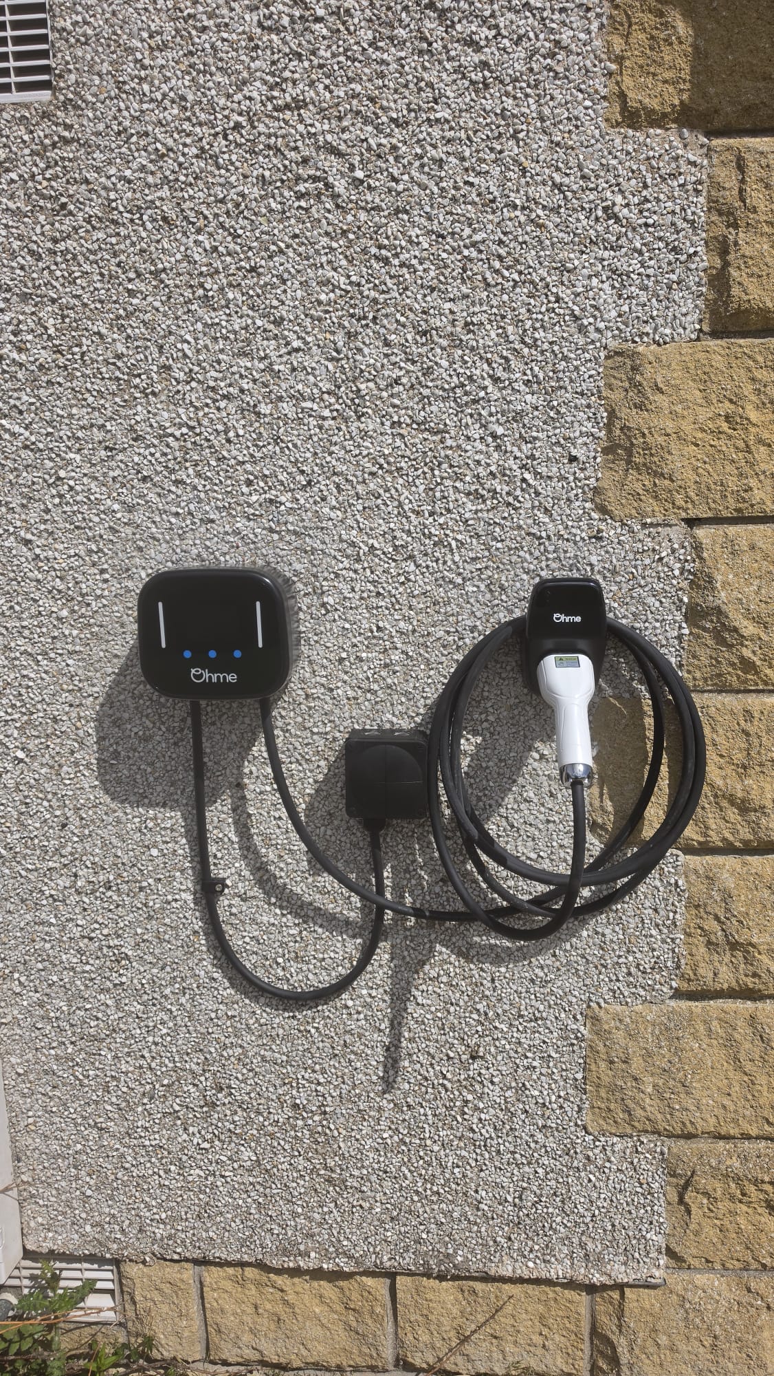 Completed EV charger install on the corner of a sandstone Mannofield house