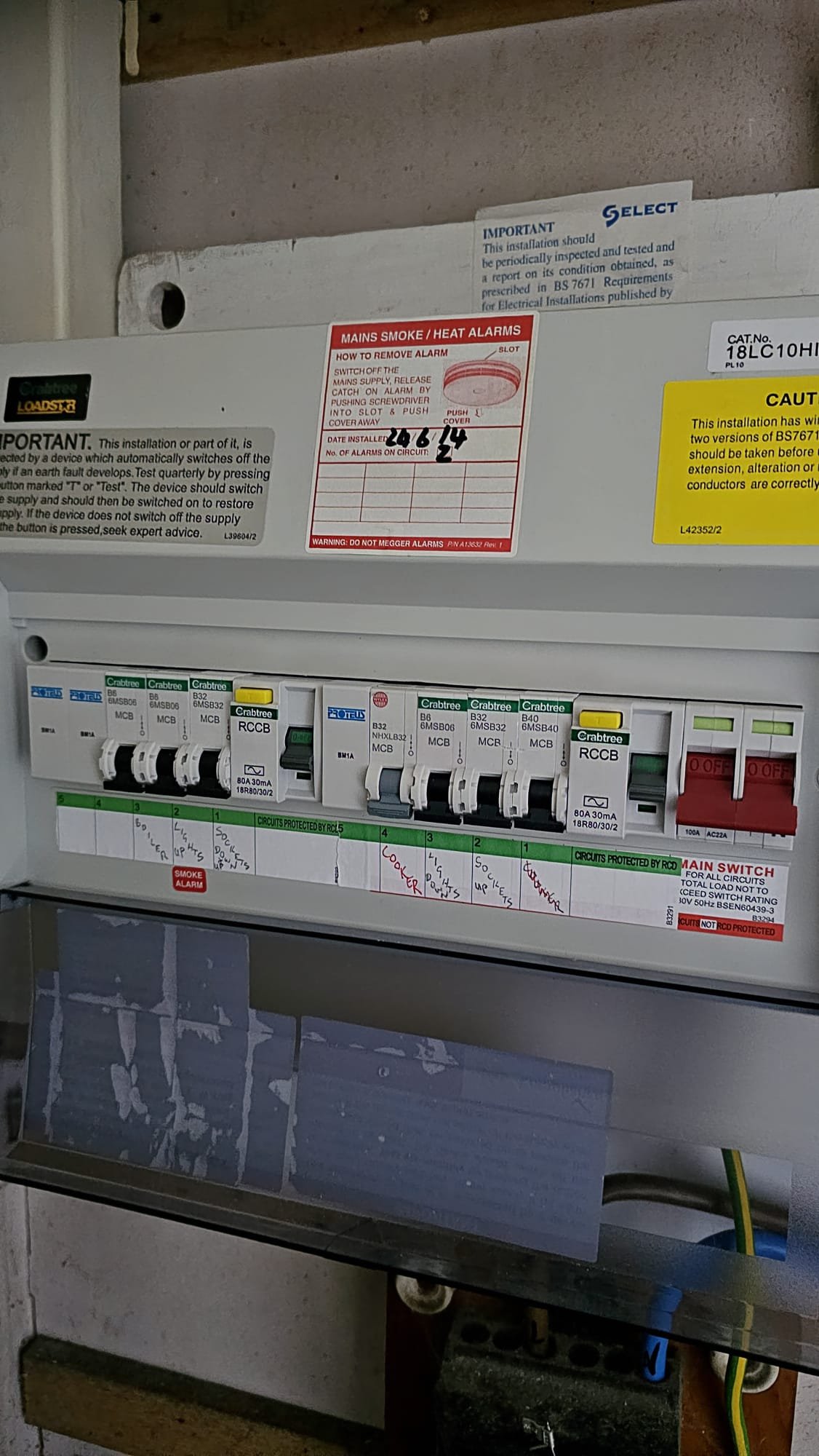 The original Crabtree Loadstar split-load board in Aberdeen. Before photo from a consumer unit upgrade with SELECT certification sticker visible