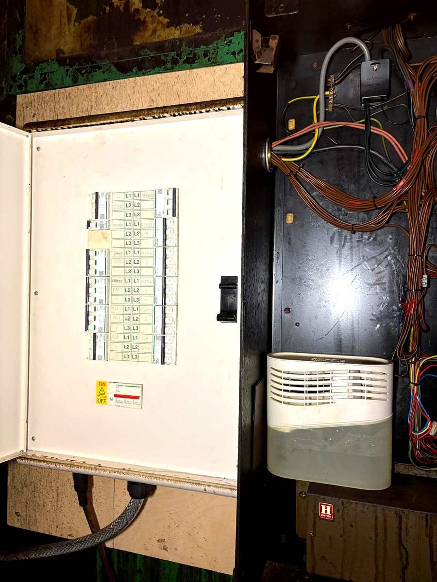 Older electrical installation being inspected during an EICR at an Aberdeenshire property