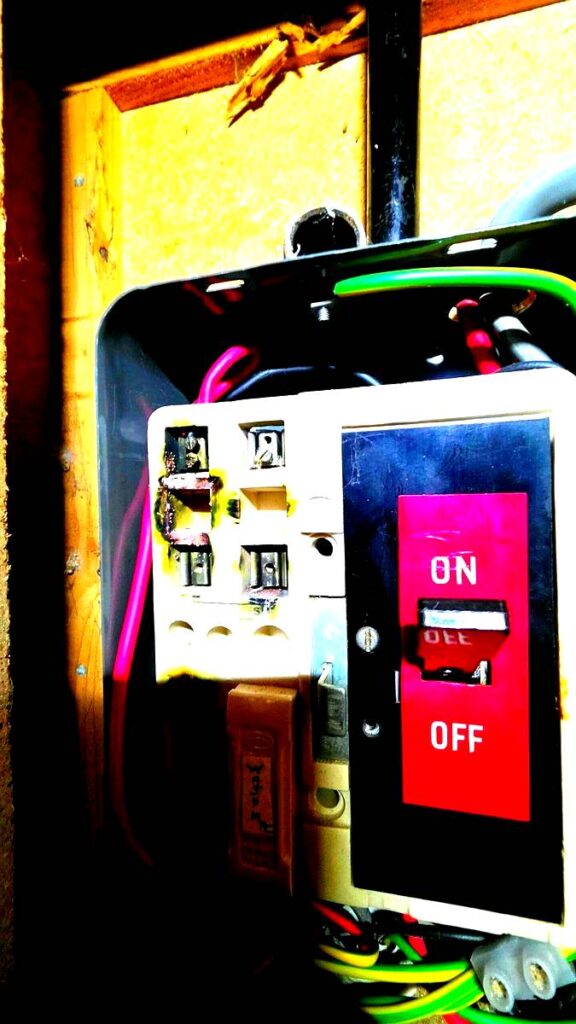 Burnt and damaged consumer unit found during EICR inspection in Aberdeen — a common C1 finding requiring immediate replacement