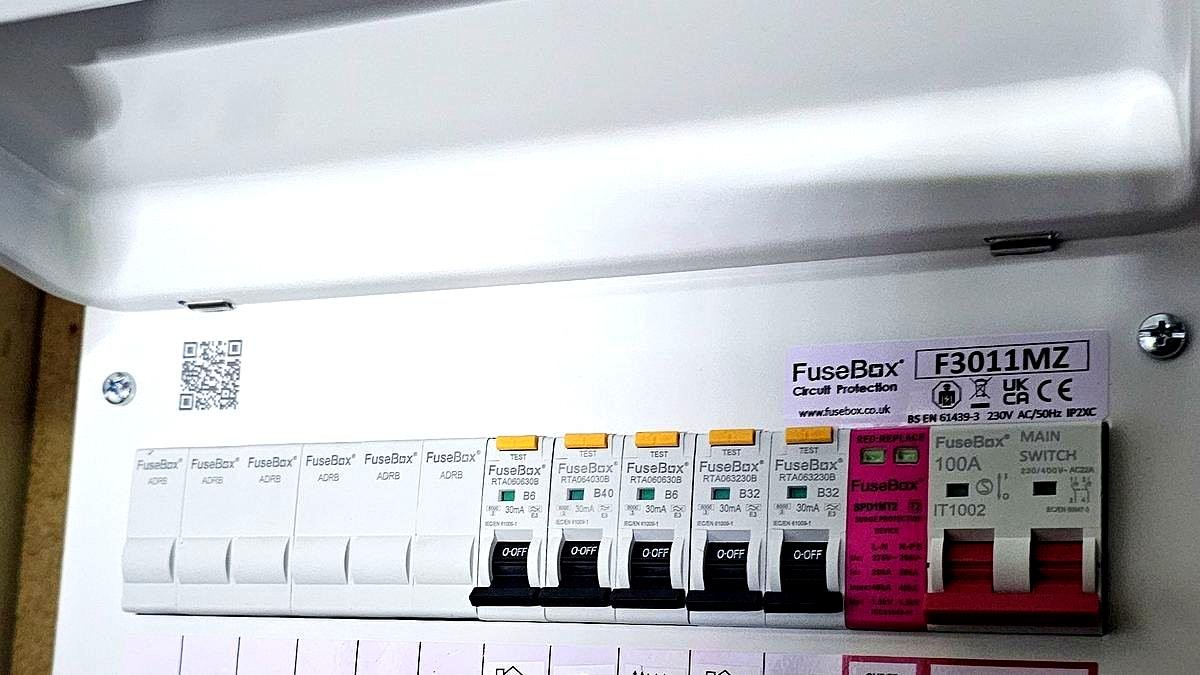 Consumer unit being inspected during an EICR at an Aberdeenshire property