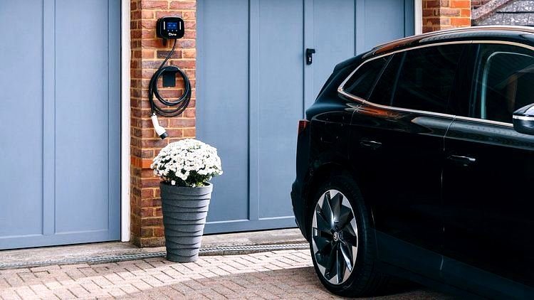 Home EV charger on a garage driveway at a Peterhead estate home