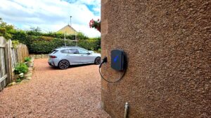 Hypervolt Home 3 EV charger installed on granite render wall in Kintore Aberdeenshire by Faithful Spark Electricians