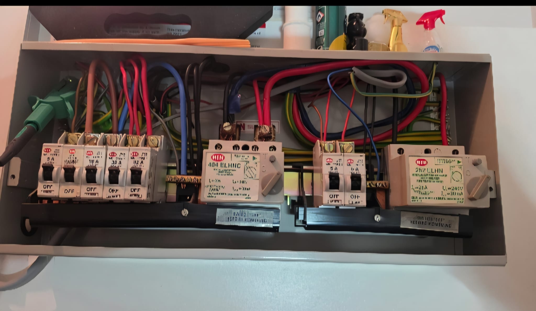 The original consumer unit on Park Place, Aberdeen, before Faithful Spark Electricians replaced it: two separate switches, no linked main switch, crowded wiring and shared RCD protection