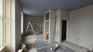 Boarded room in Fraserburgh with recessed downlights in the ceiling and cable drops ready for accessories